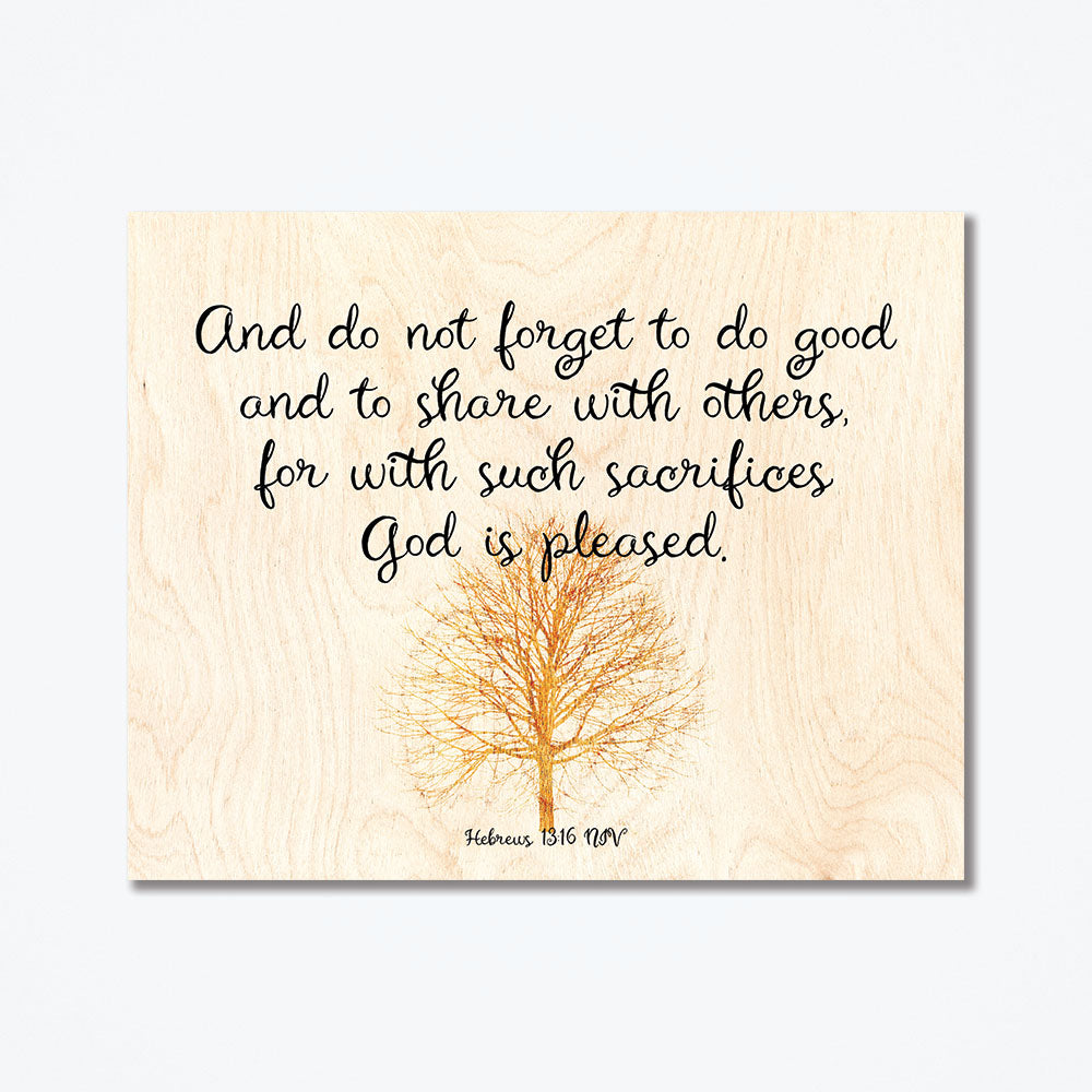 Wood poster with text from hebrews 13:16 NIV.