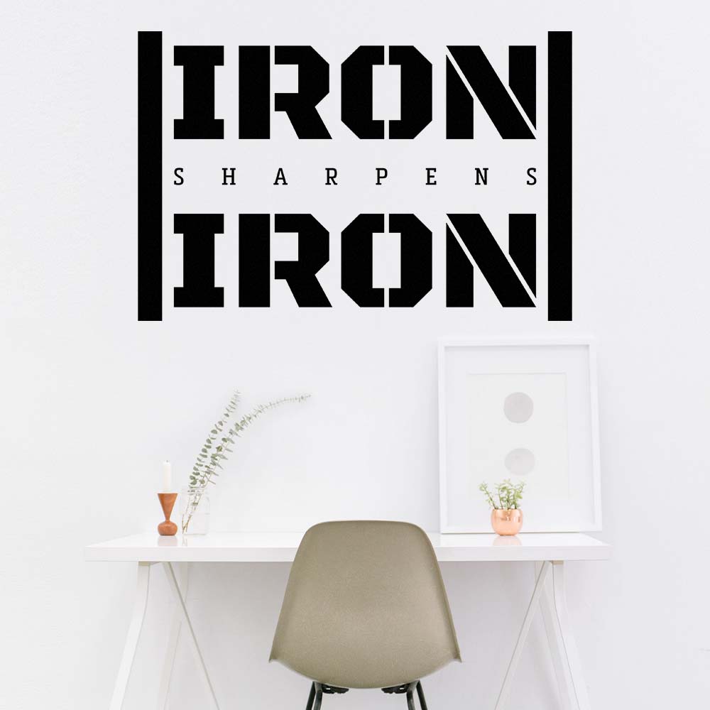 Mock up of the Iron Sharpens Iron wall sticker in your home office.