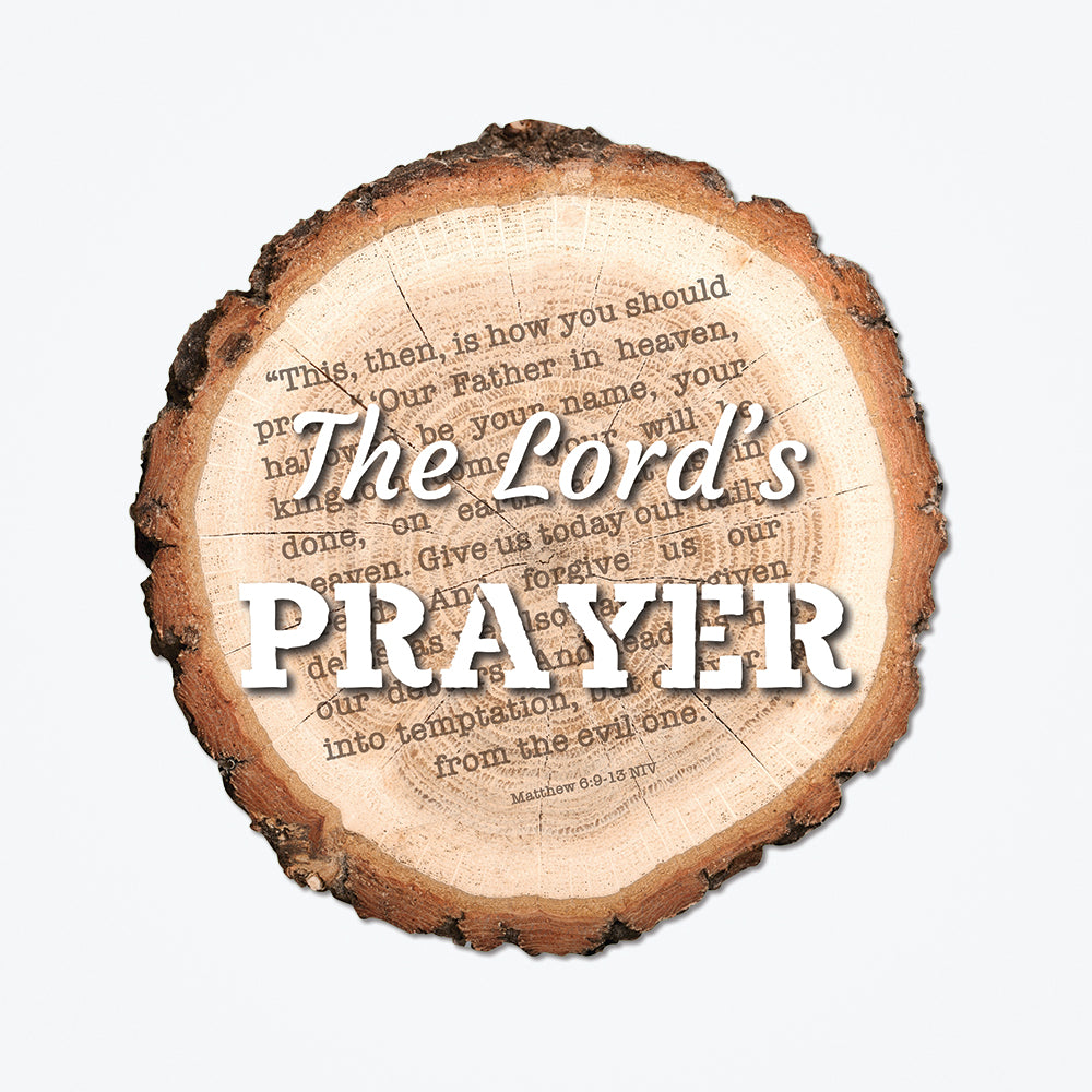 The Lord's Prayer metal float panel incorporates a wooden stump background with various text around the deisgn