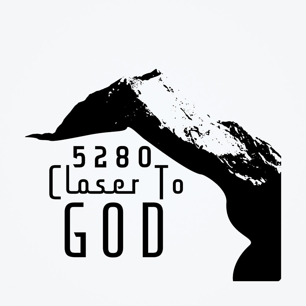 A wall sticker of a mountain with a white background and black accents.